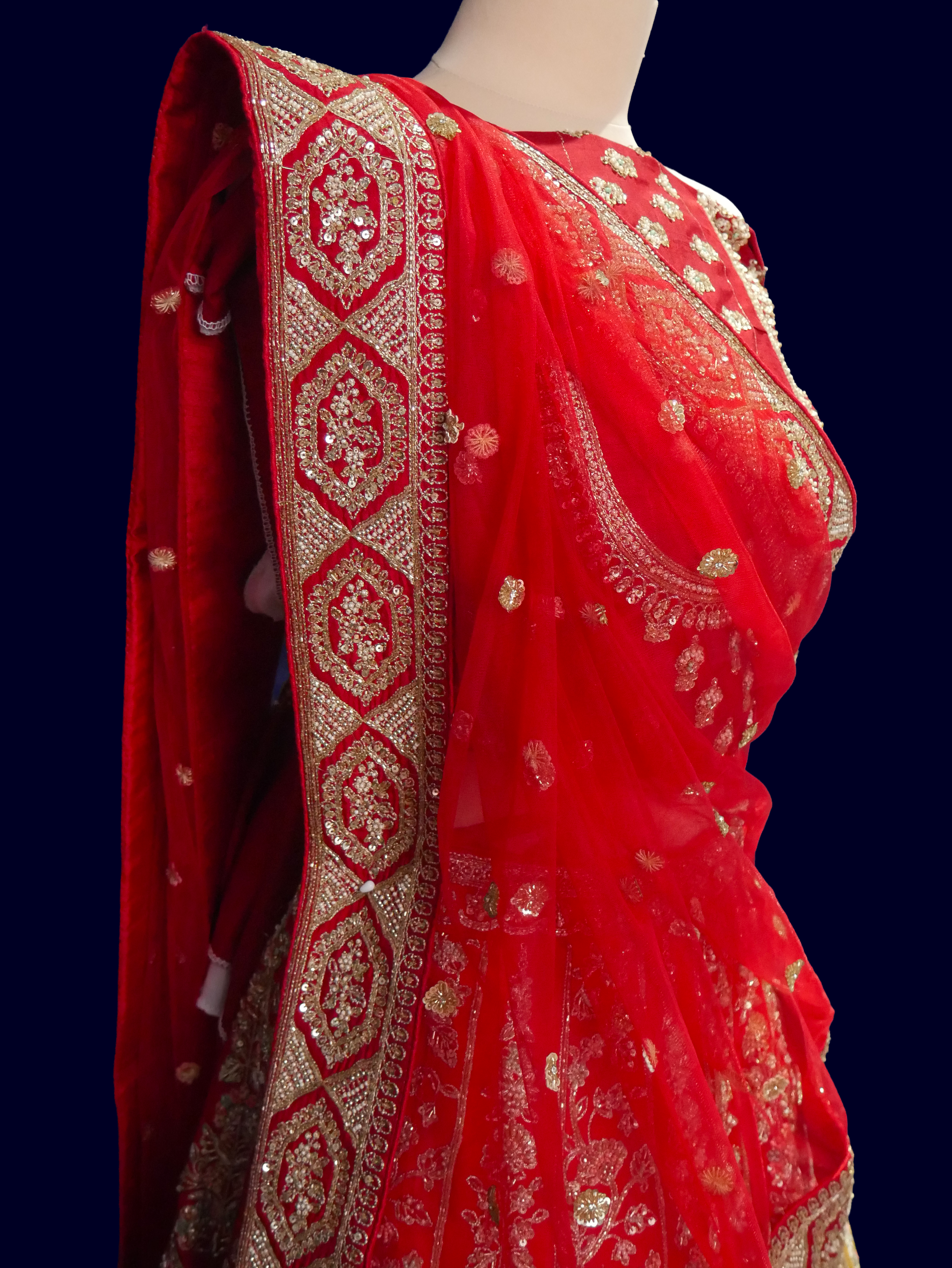 red bridal lehenga close up