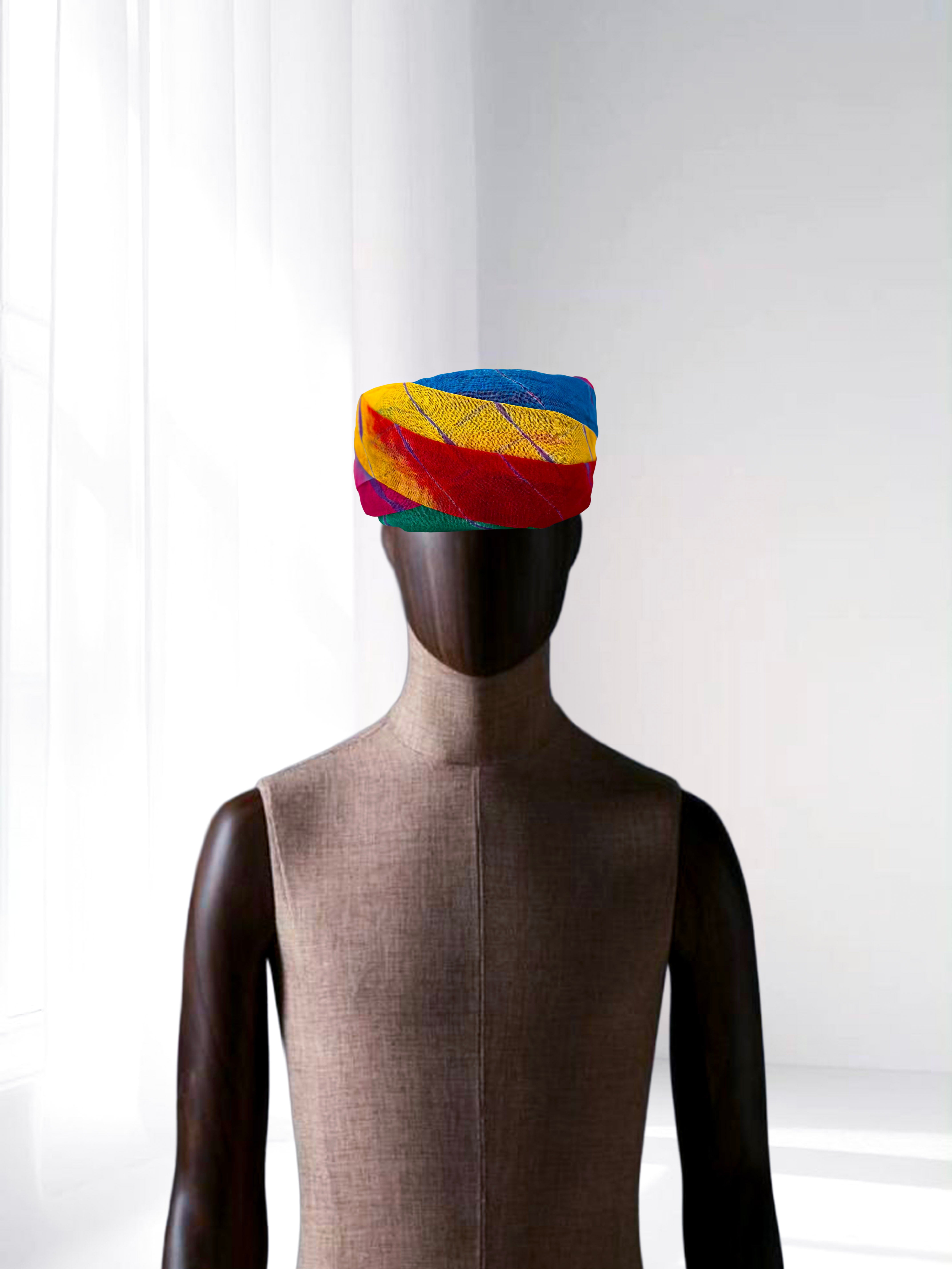 Traditional multicolor Rajasthani safa turban for weddings and festive celebrations.