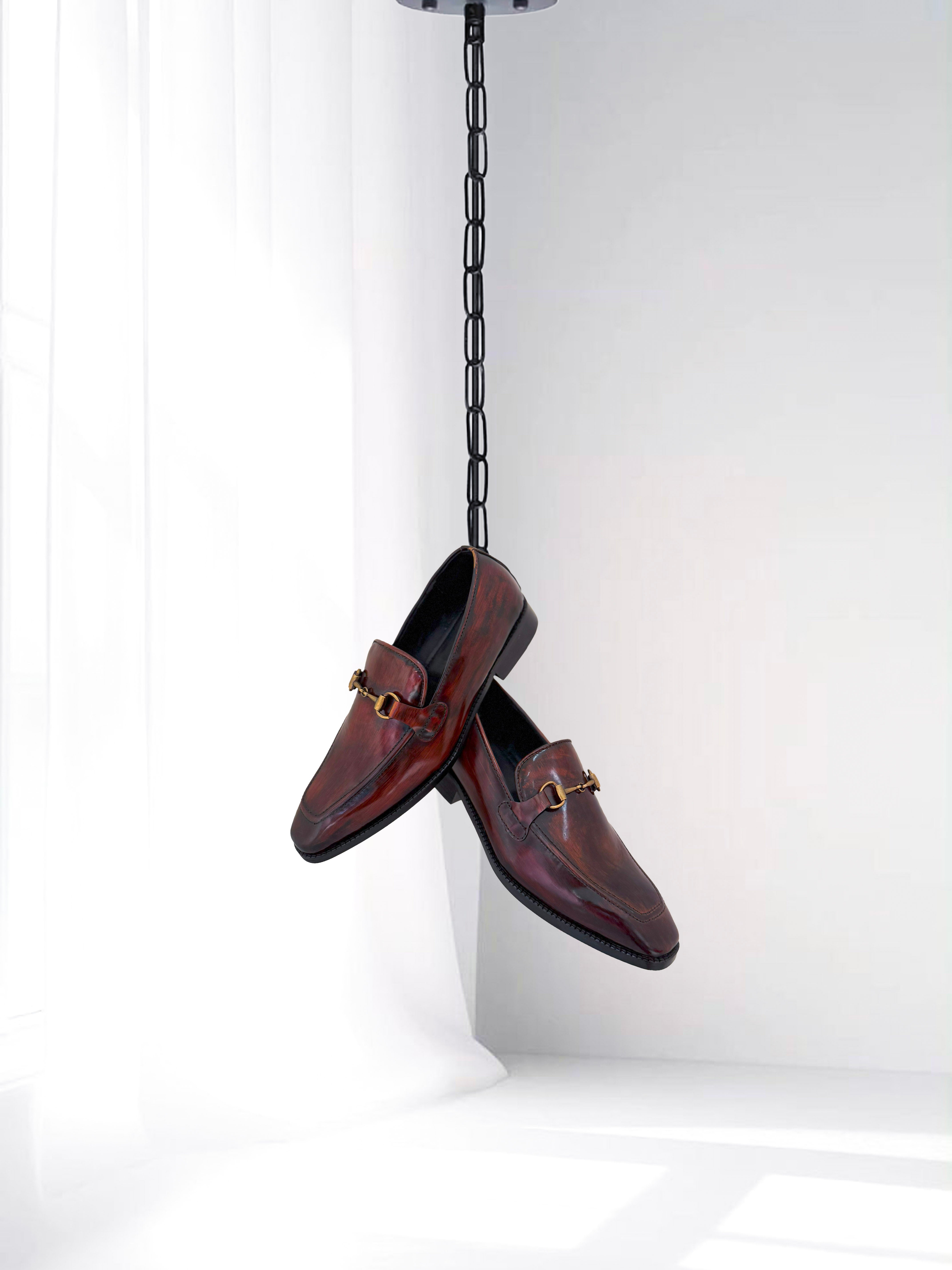 Men’s maroon leather loafers with gold buckle – formal and ethnic shoes for weddings and occasions.