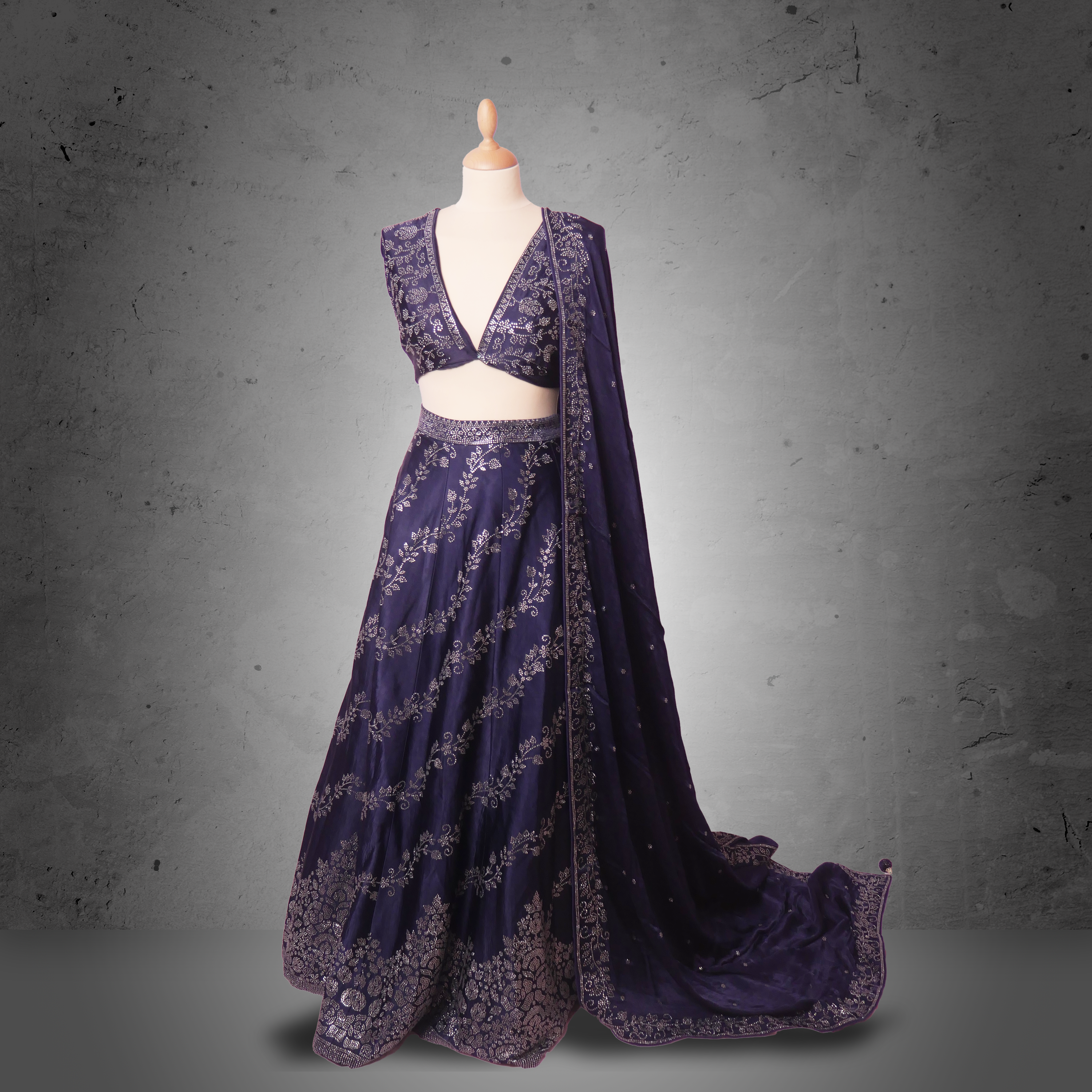 Unstitched navy blue lehenga with tonal sequin embroidery and matching dupatta. Ideal for festive and partywear occasions.